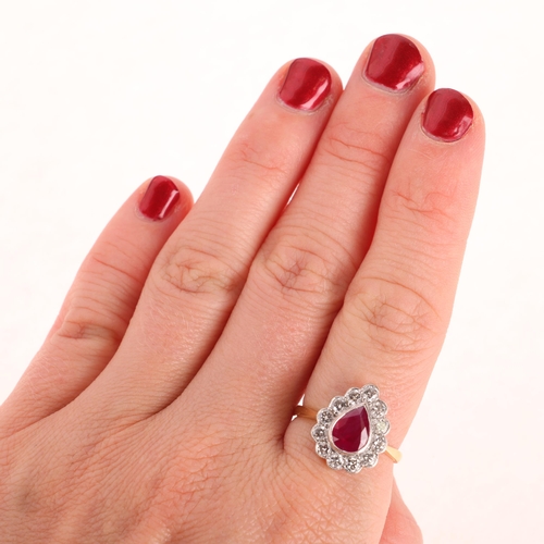 1203 - An 18ct gold ruby and diamond pear cluster ring, rub-over set with pear-cut ruby and modern round br... 