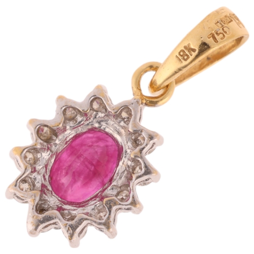 1204 - An 18ct gold ruby and diamond flowerhead cluster pendant, set with oval mixed-cut ruby and modern ro... 