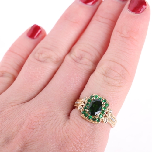 1210 - A 14ct gold green garnet and diamond cluster ring, setting height 12.8mm, size O, 4.1g