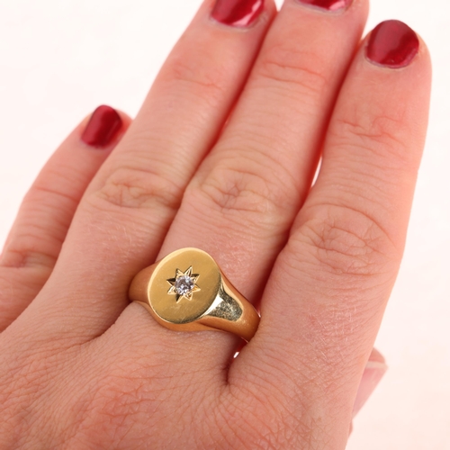 1216 - An 18ct gold 0.1ct single stone diamond signet ring, maker MJ, London 1987, the oval panel star set ... 