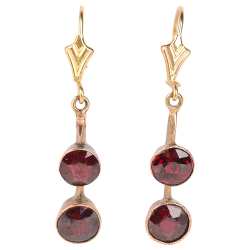 1218 - A pair of 9ct gold garnet drop earrings, each set with 2 round-cut garnets, with kidney fittings, 32... 