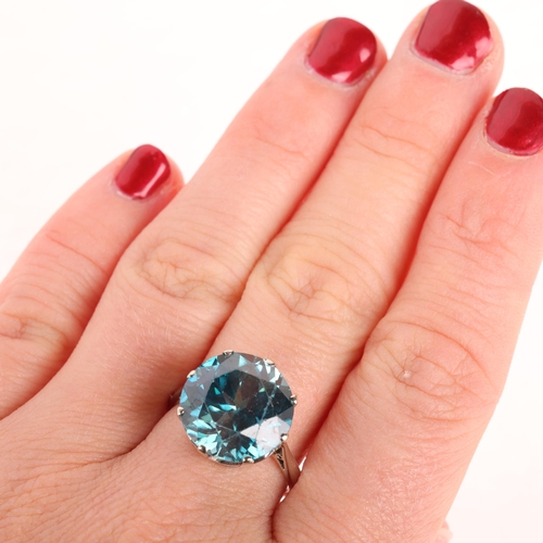 1229 - An Art Deco 9ct white gold single stone blue zircon ring, set with 14mm round-cut zircon, size P, 5.... 