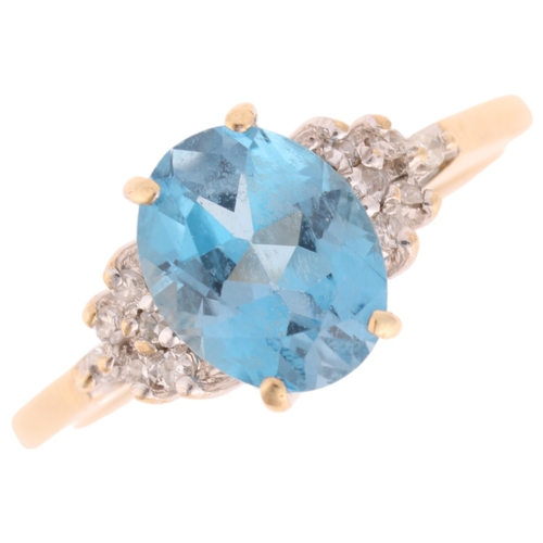 1232 - A 9ct gold blue topaz and diamond dress ring, maker GF Ltd, London 1989, set with oval mixed-cut top... 