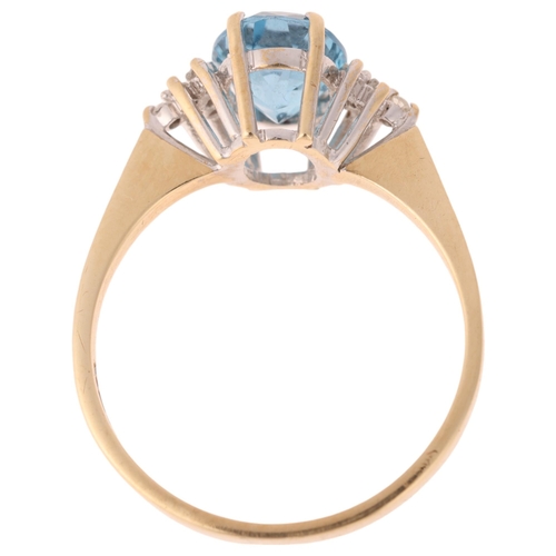 1232 - A 9ct gold blue topaz and diamond dress ring, maker GF Ltd, London 1989, set with oval mixed-cut top... 