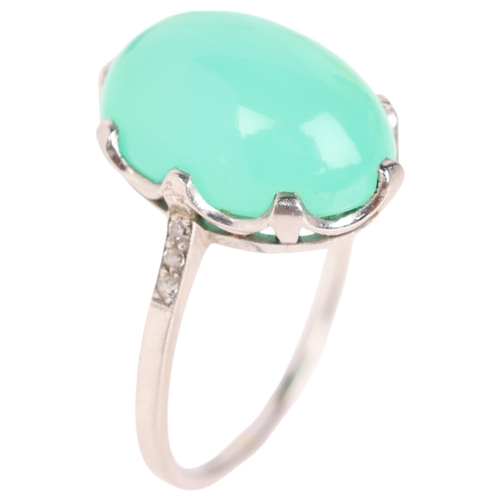 1238 - A platinum single stone chalcedony dress ring, set with oval cabochon chalcedony with single-cut dia... 