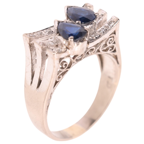 1241 - A 14ct white gold sapphire and diamond cocktail ring, in the Art Deco style, set with pear-cut sapph... 