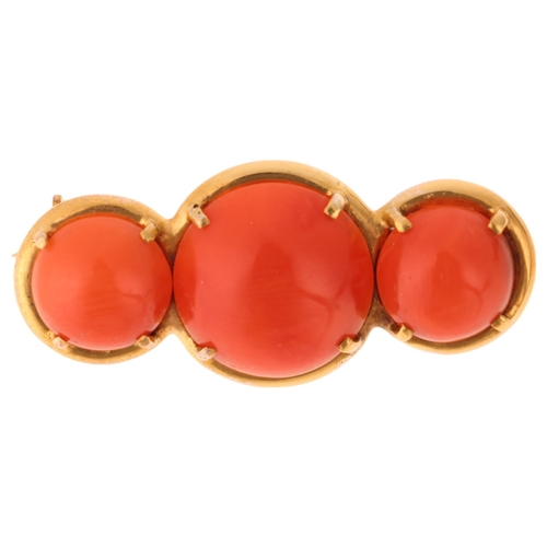 1244 - A 9ct gold three stone button coral brooch, unmarked mount tests as 9ct gold 30.5mm, 4.2g