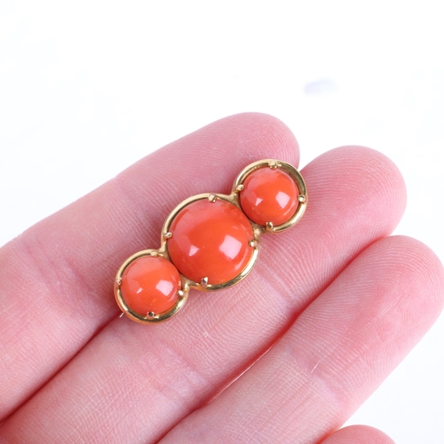 1244 - A 9ct gold three stone button coral brooch, unmarked mount tests as 9ct gold 30.5mm, 4.2g