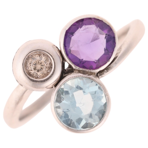 1245 - An 18ct white gold gem set dress ring, set with amethyst blue topaz and diamond, setting height 11.7... 