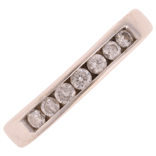 1254 - An 18ct white gold diamond quarter eternity ring, by Iliana, channel set with modern round brilliant... 