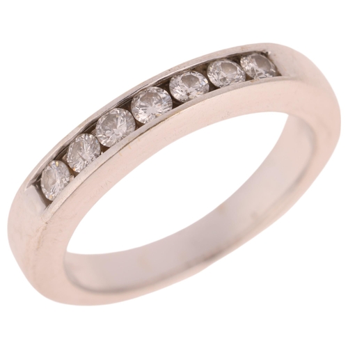 1254 - An 18ct white gold diamond quarter eternity ring, by Iliana, channel set with modern round brilliant... 