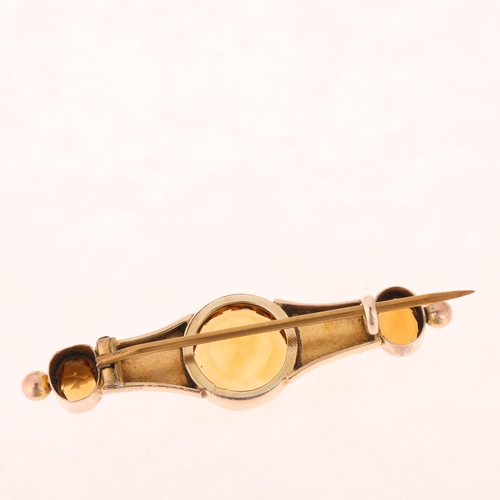 1259 - An Antique 9ct rose gold citrine brooch, set with round and oval-cut citrines with foliate engraved ... 