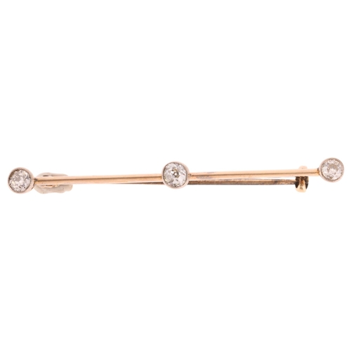 1260 - An Antique 14ct gold three stone diamond bar brooch, set with old European-cut diamonds, total diamo... 