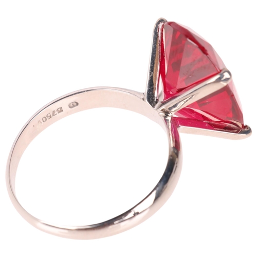 1261 - A 9ct white gold single stone synthetic ruby dress ring, claw set with oval mixed-cut ruby, setting ... 