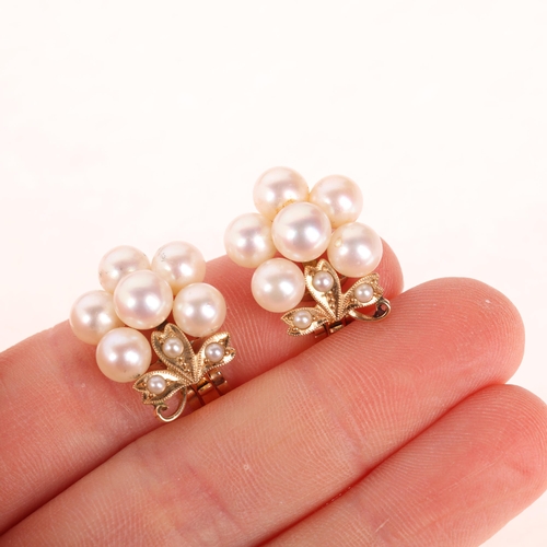 1264 - A pair of 14ct gold cultured pearl floral clip-on earrings, 20.5mm, 8.3g