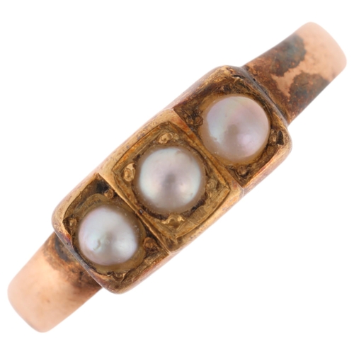 1271 - A Victorian three stone pearl mourning ring, apparently unmarked, closed-back settings, setting heig... 