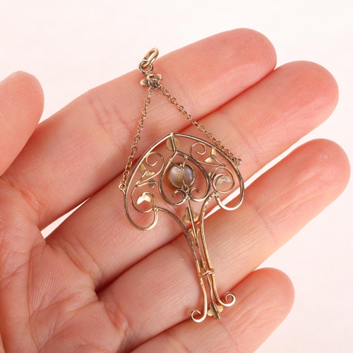 1272 - An Art Nouveau Edwardian 9ct rose gold blister pearl openwork lavaliere pendant, circa 1905, the clu... 