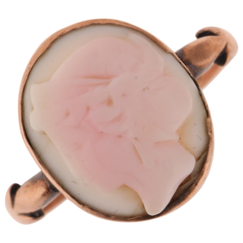 1275 - A 9ct rose gold pink conch shell cameo ring, relief carved depicting female profile, setting height ... 