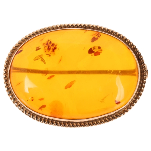 1279 - A 9ct gold amber brooch, maker RBS, Birmingham 1982, 33.1mm, 5.3g