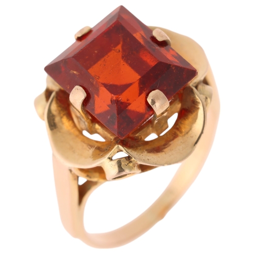 1280 - A 9ct gold orange hessonite garnet dress ring, set with rectangular step-cut garnet, unmarked mount ... 