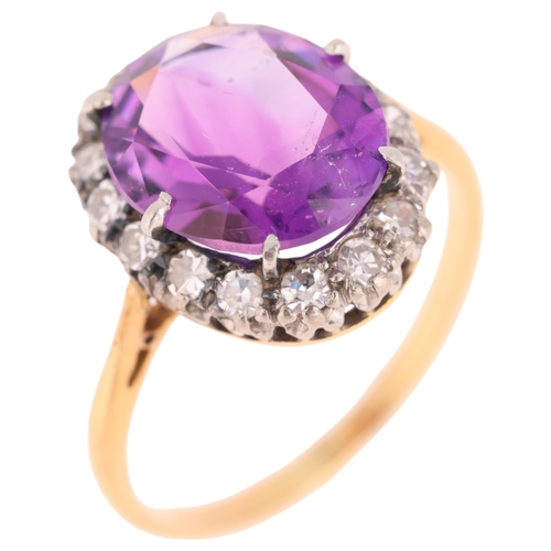 1283 - An 18ct gold amethyst and diamond cluster ring, set with oval mixed-cut amethyst and single-cut diam... 