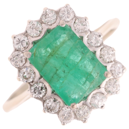 1285 - An 18ct white gold emerald and diamond cluster ring, set with octagonal step-cut emerald and modern ... 