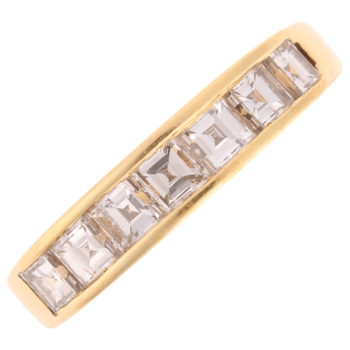 1286 - An 18ct gold diamond half eternity ring, channel set with square baguette-cut diamonds, total diamon... 