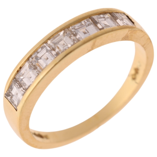 1286 - An 18ct gold diamond half eternity ring, channel set with square baguette-cut diamonds, total diamon... 