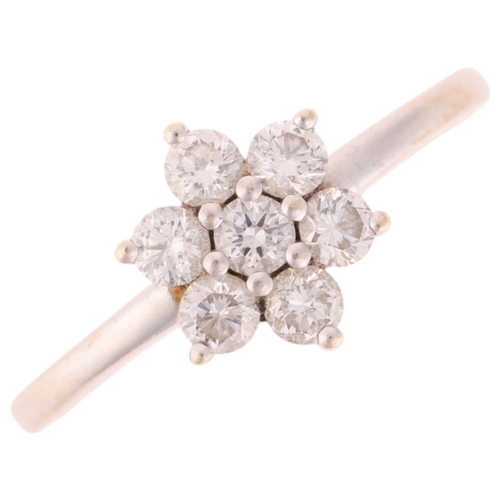 1287 - A 9ct white gold diamond flowerhead cluster ring, maker GMC, London 2016, set with modern round bril... 