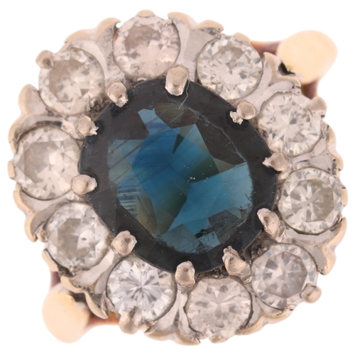 1291 - An 18ct gold sapphire and diamond oval cluster ring, set with oval mixed-cut sapphire and modern rou... 