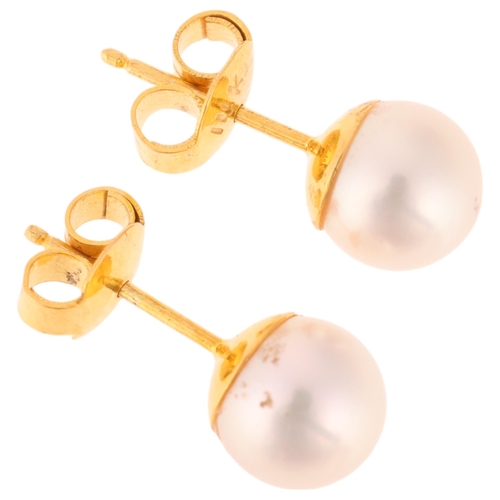 1306 - A pair of Japanese 14ct gold cultured pearl stud earrings, each set with 7.3mm pearl, 1.9g