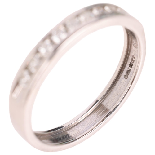 1313 - An 18th white gold diamond half eternity ring, channel set with modern round brilliant-cut diamonds,... 