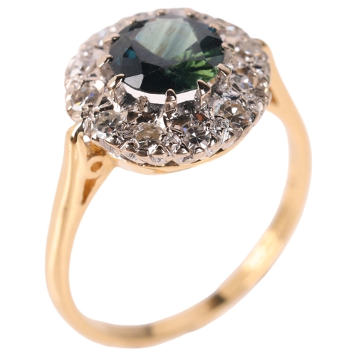 1314 - An 18ct gold sapphire and diamond cluster ring, maker P&G, Birmingham 1968, set with round-cut green... 