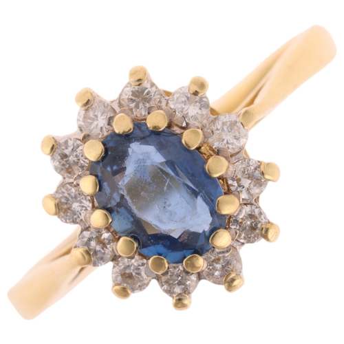 1317 - An 18ct gold sapphire and diamond oval cluster ring, maker GJ, Birmingham 1987, set with oval mixed-... 