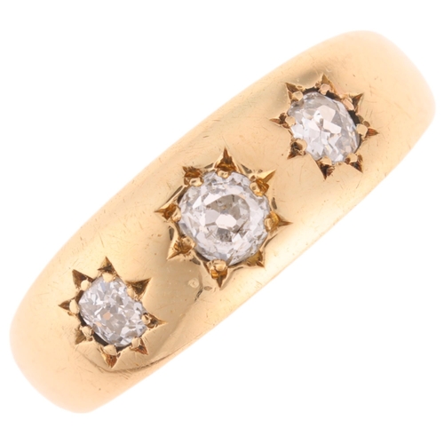 1320 - An Antique 18ct gold three stone diamond gypsy ring, star set with old-cut diamonds total diamond co... 