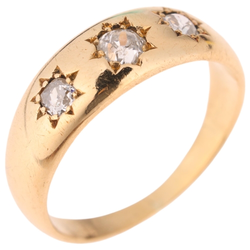 1320 - An Antique 18ct gold three stone diamond gypsy ring, star set with old-cut diamonds total diamond co... 