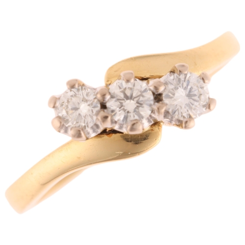 1321 - An 18ct gold three stone diamond ring, set with modern round brilliant-cut diamonds, total diamond c... 