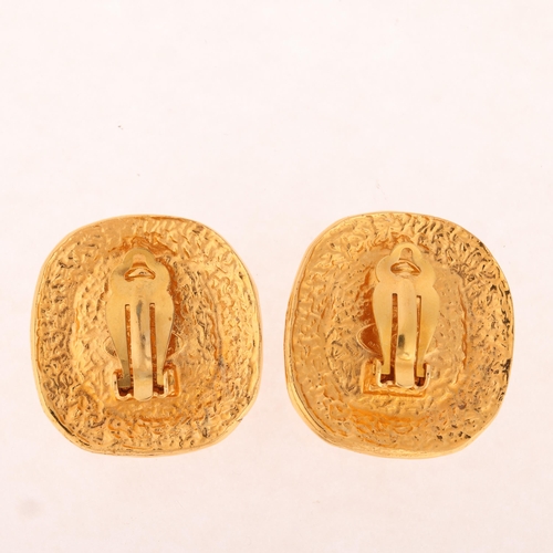 1333 - CHANEL - a pair of Vintage gilt-metal green Gripoix glass clip-on earrings, signed and numbered 26, ... 