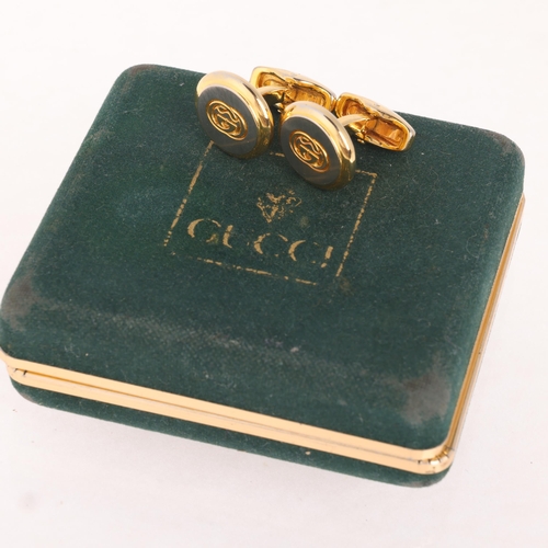 1336 - GUCCI - a pair of gold plated GG monogram cufflinks, 16.8mm, 16.7g, boxed