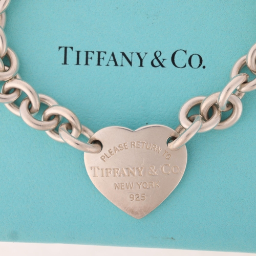 1337 - TIFFANY & CO - a sterling silver 'Please Return To Tiffany & Co' heart toggle bracelet, 19cm, 26.9g,... 