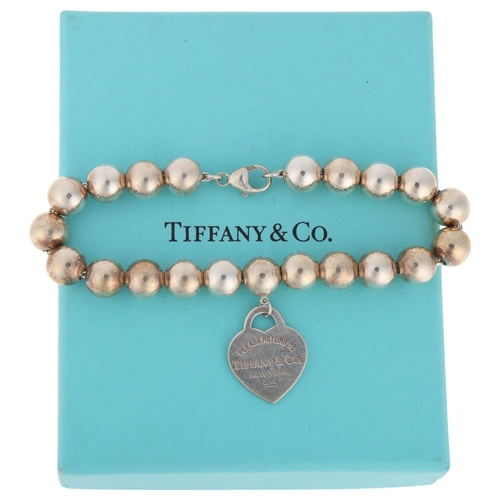 1339 - TIFFANY & CO - a sterling silver 'Please Return To Tiffany & Co' heart toggle bead bracelet, 18cm, 1... 