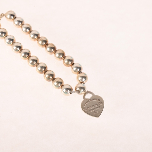 1339 - TIFFANY & CO - a sterling silver 'Please Return To Tiffany & Co' heart toggle bead bracelet, 18cm, 1... 