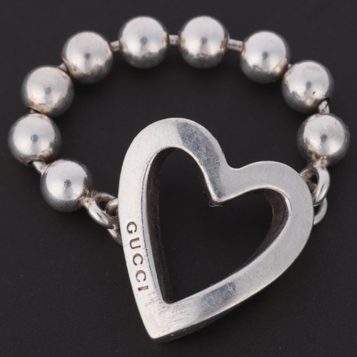 1341 - GUCCI - a sterling silver beaded chain heart ring, setting height 15.9mm, size O, 4.4g, boxed