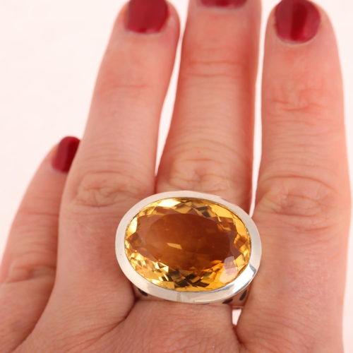 1353 - A large sterling silver citrine and black enamel leopard ring, setting height 21mm, size W, 20.6g