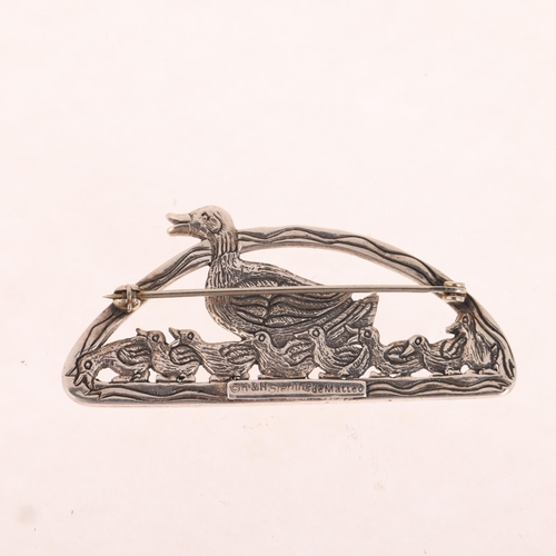 1355 - HAND & HAMMER (DEMATTEO) - an American sterling silver 'Duck Family' brooch, 53.1mm, 13g