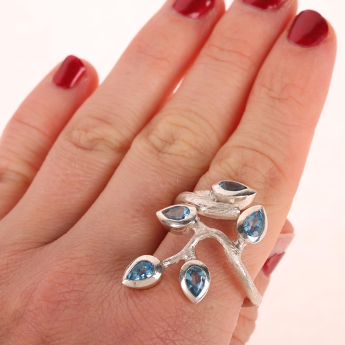 1360 - A sterling silver blue topaz naturalistic branch ring, setting height 33.3mm, size approx P, 10.5g