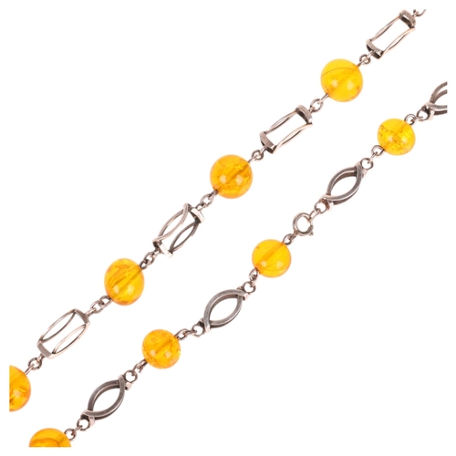 1363 - G KRAMER - a Vintage German silver and amber necklace, 56cm, 29.6g