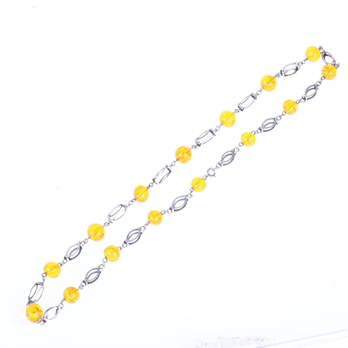 1363 - G KRAMER - a Vintage German silver and amber necklace, 56cm, 29.6g