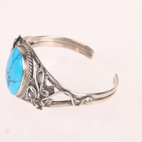 1367 - A Continental sterling silver simulated turquoise cuff bangle, floral shoulders, setting height 31.2... 