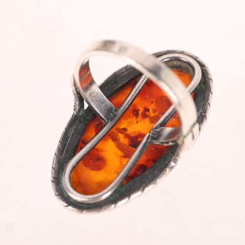 1376 - A Polish sterling silver Baltic amber ring, setting height 32.2mm, size N, 6.9g